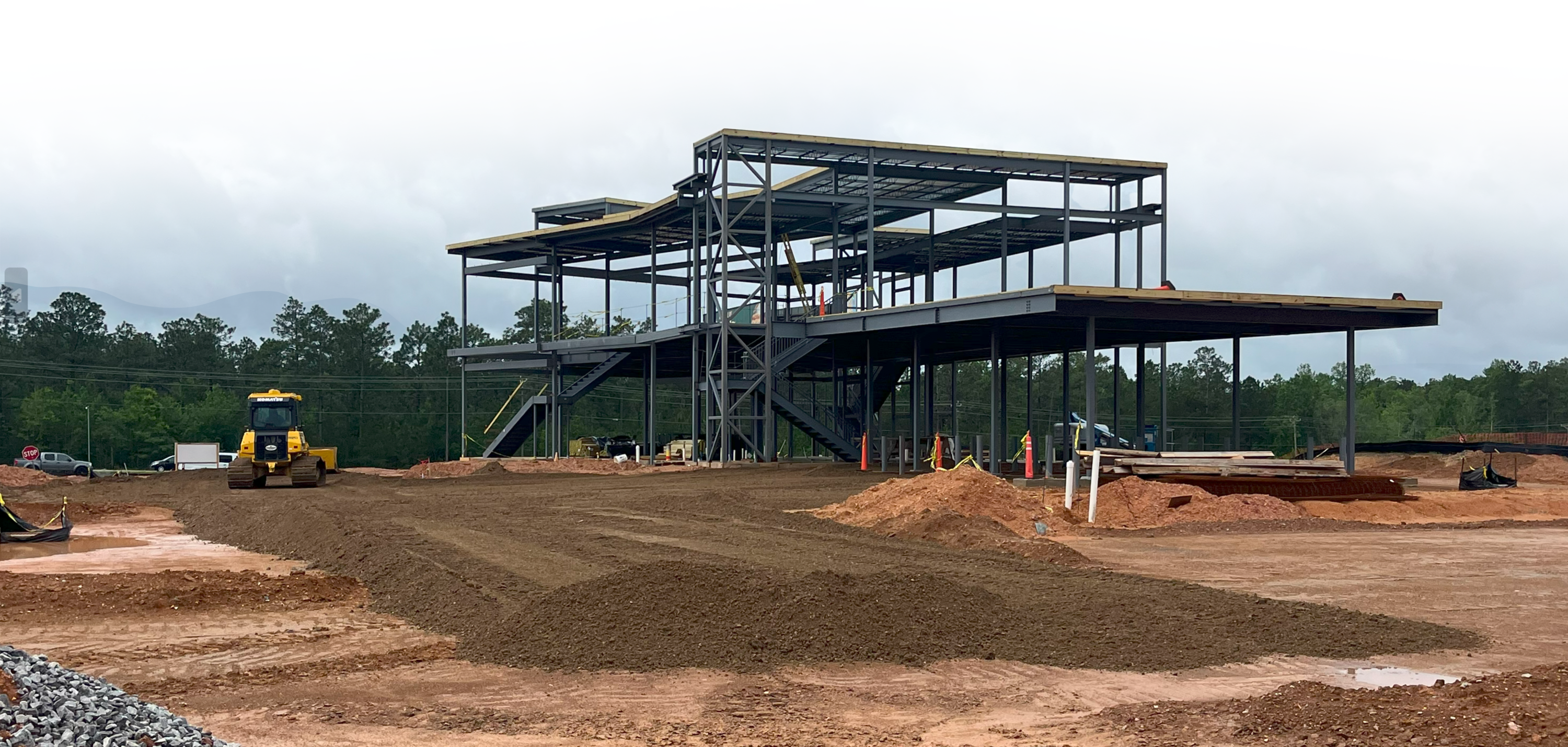 construction of a large building in black and white